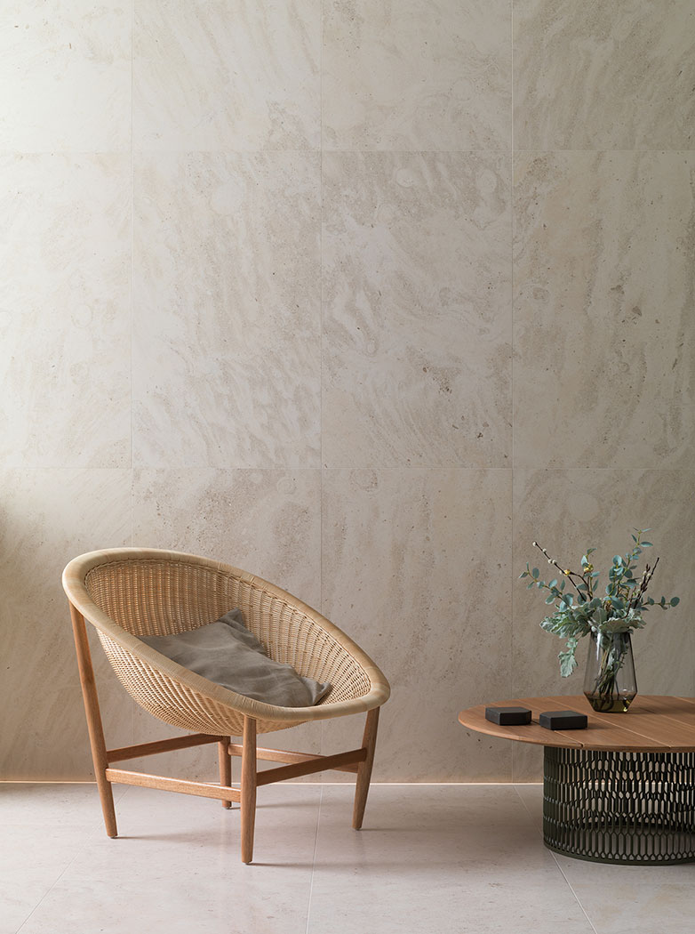 Silvia-Mar-Studio-Art-direction-Porcelanosa-stone-covering-wood-floor-kettal-straw-armchair